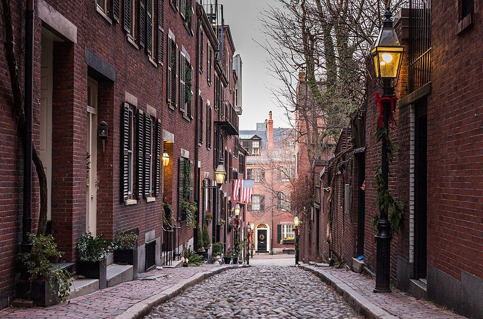 Historic Acorn Street in Beacon Hill, Boston during fall season